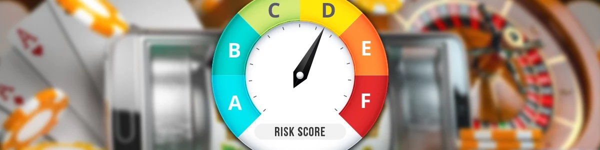 Round counter with different colors and the letters a b c d e f showing a risk score on a blurred background showing casino games