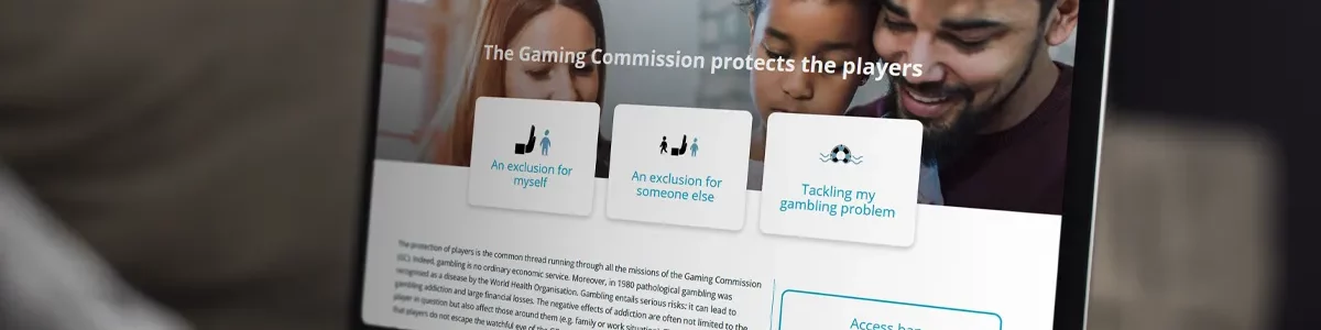 A laptop displaying the gambling commission website.